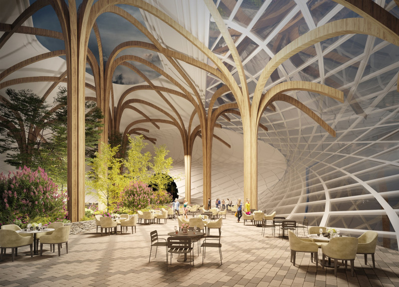 Curved Roof of Glass and Local Stone Envelops a Dining Oasis in Volcanic Landscape