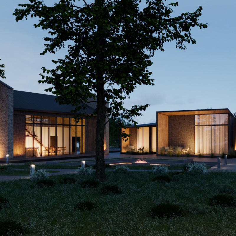 Charred Wooden Shingles Enveloping A Sustainable Guesthouse Amidst Vineyards  