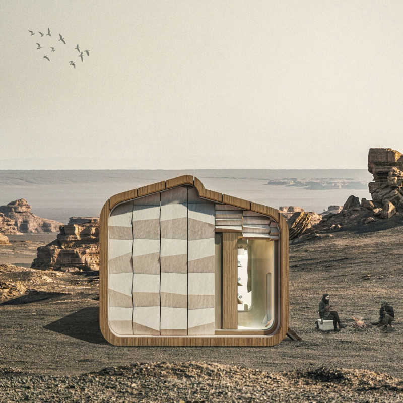 Charred Wooden Shingles and Natural Stone Create a Sustainable Dwelling in the Gobi Desert