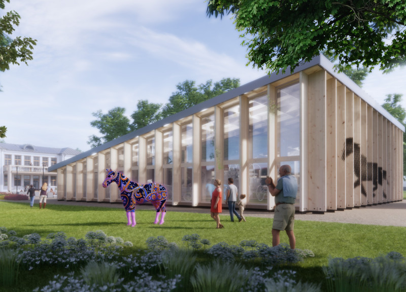 Charred Wooden Shingles and Horseshoe Motif Revitalize Historical School Into Educational Center