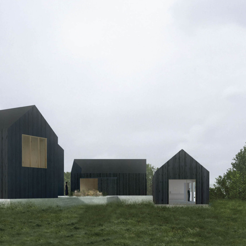 Blackened Timber Cladding and Central Garden in a Flexible Artistic Workspace