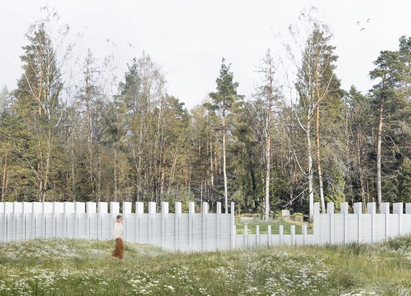 Curved Niches and White Gravel Shaping a Reflective Memorial Space  